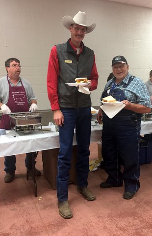 T. J. Farnsworth from Utah standing just under 7 foot tall and ITLA past president Gary Bruch of Kansas. T. J. Farnsworth from Utah standing just under 7 foot tall and ITLA past president Gary Bruch of Kansas.